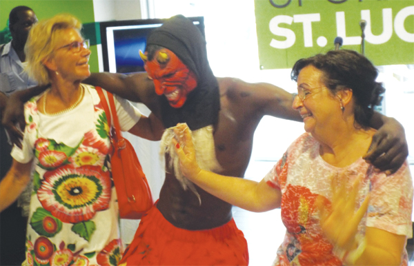 Image: Caught! Papa Jab managed to snag two unwitting tourists with his charm.
