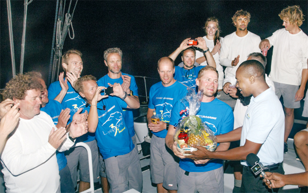 SLTB John Emmanuel presenting an all fruit basket to the "Leopard by Finland" crew. (PHOTO: VOICE, Isabelle Sanka)
