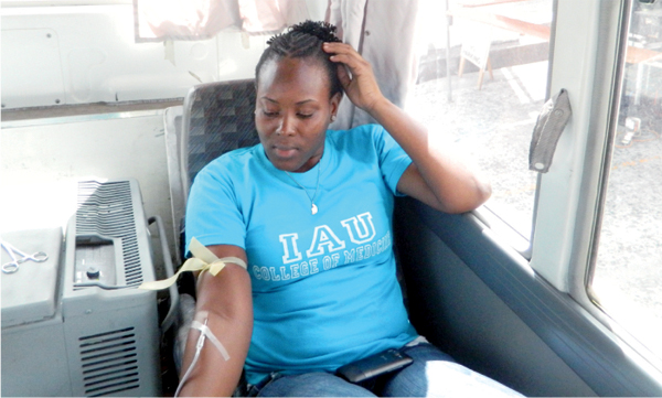 One of the students donating blood.