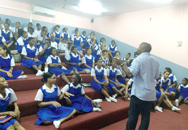 Teddyson John addressing girls at St. Joseph's Convent