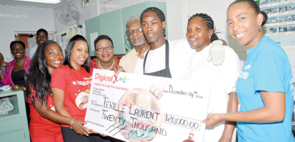 Terille Laurent (third from right) with DIGICEL and Bay Gardens pesonnel
