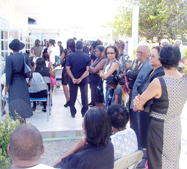 Mourners outside Rambally's funeral chapel