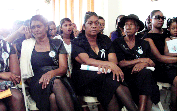 Family members at Sunday's funeral services.