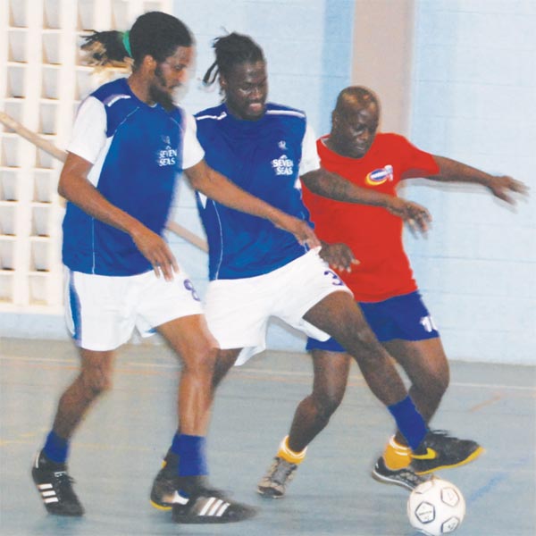 Game 2 saw Bryden and Partners in blue and white outfit whipped Harris Paints Limited 7-1. (Photo: Anthony De Beauville)