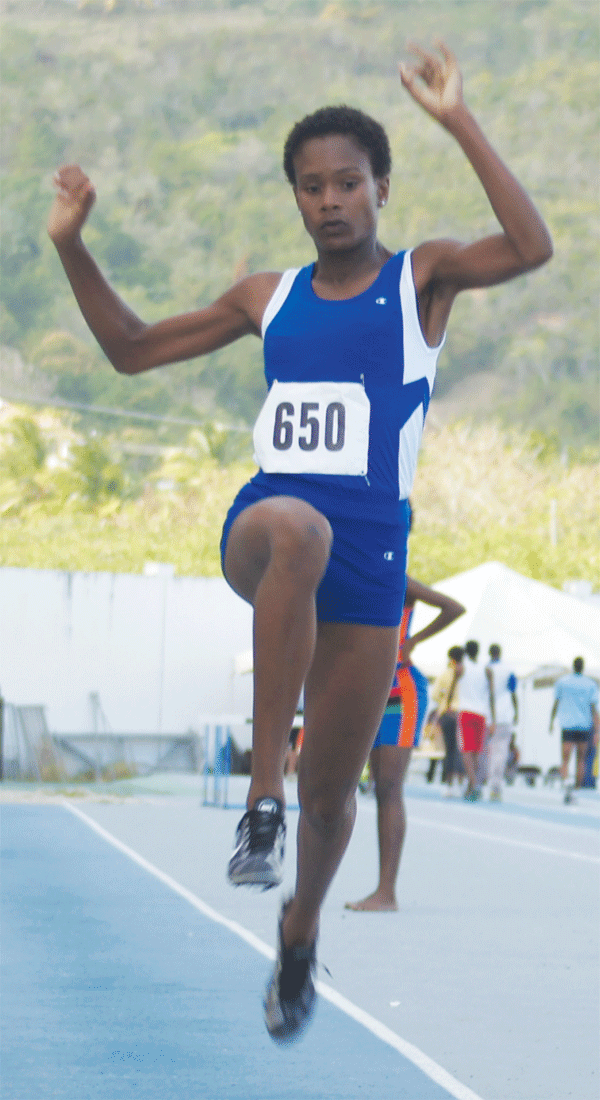 St. Joseph's Convent Nysa Pierre wins girls long jump with a distance of 5.18 metres. [Photo: Anthony De Beauville]