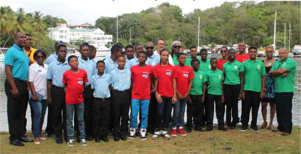 A photo moment with St. Lucia's Prime Minister Dr. Kenny Anthony for St. Lucia junior sports personalities. [Photo: Anthony De Beauville]