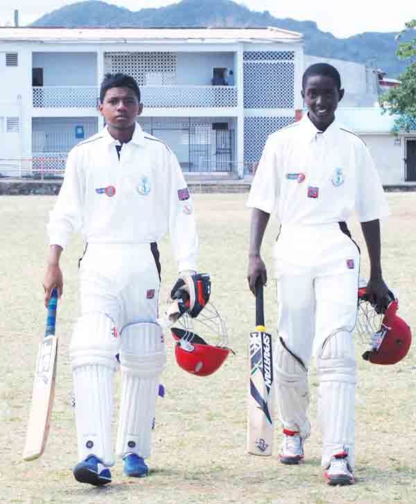 (L-R) 119 runs partnership for St.Lucia opening pair Chaz Cepal and Kimani Melius [Photo: Anthony De Beauville]