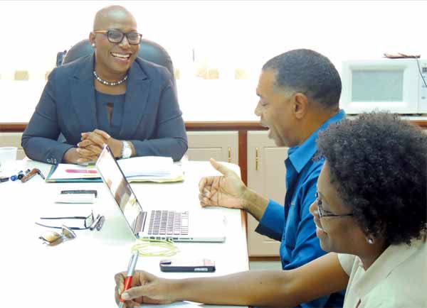 Dr. Rigobert, Augier and Louisy in a light moment