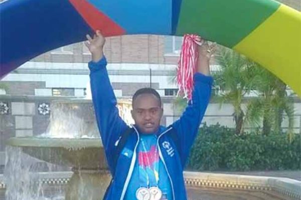 Gold medal moment for St. Lucia Cecil Fevriere. (photo: St. Lucia Special Olympics)