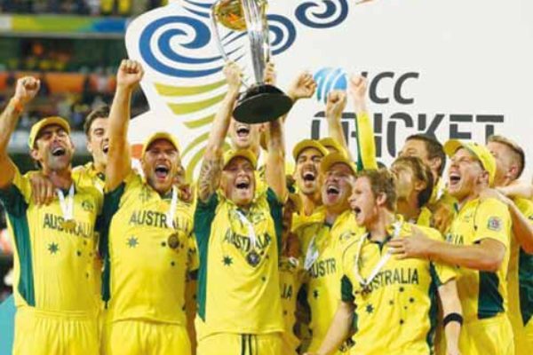 Image of fifth time champions...Michael Clarke and the Australia team celebrate with the World Cup trophy (PHOTO Getty Images Cameron Spencer)