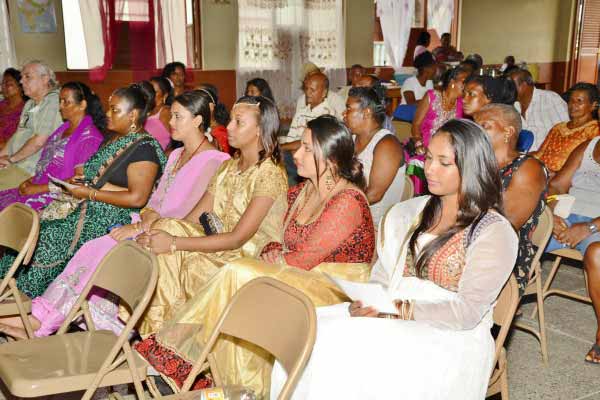 Pictures show members of the Association at the Ti Rocher event.