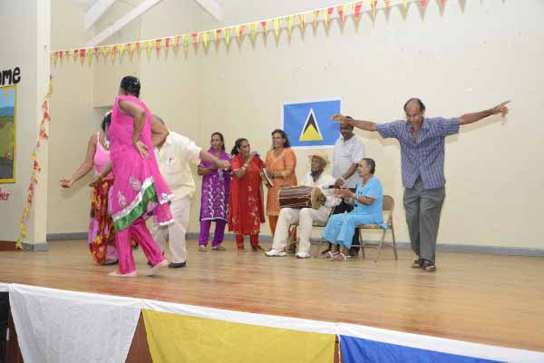 Pictures show members of the Association at the Ti Rocher event.