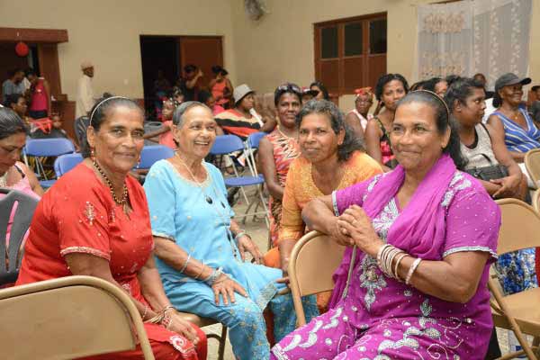 Pictures show members of the Association at the Ti Rocher event.