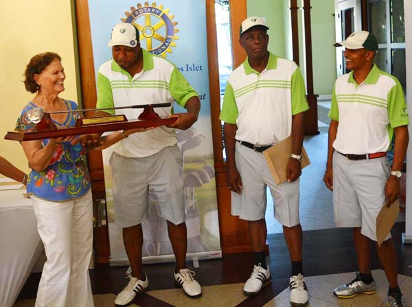 Image: Susan Guillaume presenting the Claude Guillaume Memorial trophy to Team Sandals La Toc