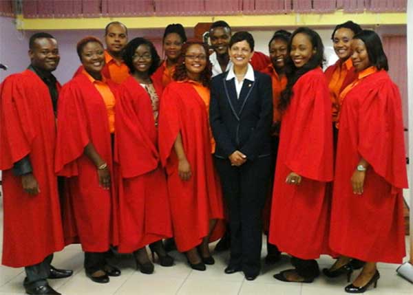 Image: Members of the newly-inducted Executive of the Open Campus Student Guild happily surround Dr. Luz Longsworth, Pro Vice-Chancellor and Principal of the Open Campus of The University of the West Indies. Fourth from right is the current Chair of the Open Campus Saint Lucia Student Guild, Mrs Marcia DolorLashley.