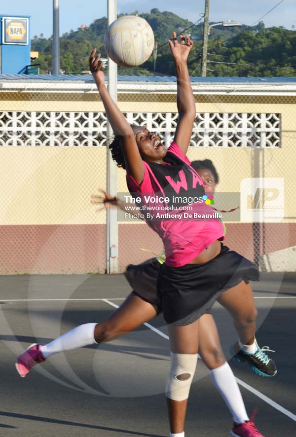 Image: N.V. Ballers (Wing Attack) Melody Charles goes for a high pass overhead against Shamrock (Photo Anthony De Beauville)