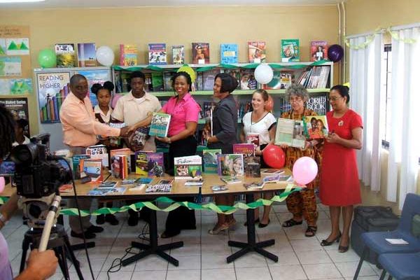 Image: The official handover of books to the Choiseul Secondary School