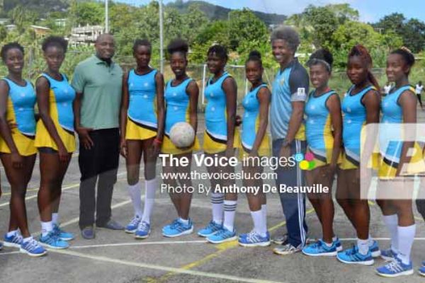 Image: A photo moment for Team St. Lucia on Saturday with Minister of Youth Development and Sports and Acting PS Dr. Anthony George. [PHOTO: Anthony De Beauville]