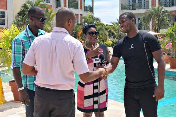 Image: Bay Gardens officials greet Sammy and Charles