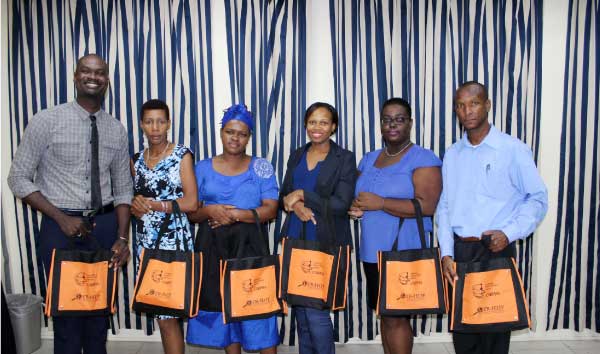 Image: The six with their certificates.