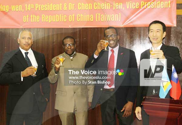Image: House Speaker Peter Foster, External Affairs Minister Alva Baptiste, Deputy Prime Minister Phillip J. Pierre and Taiwanese Ambassador Ray Mou make a toast. [PHOTO: Stan Bishop]
