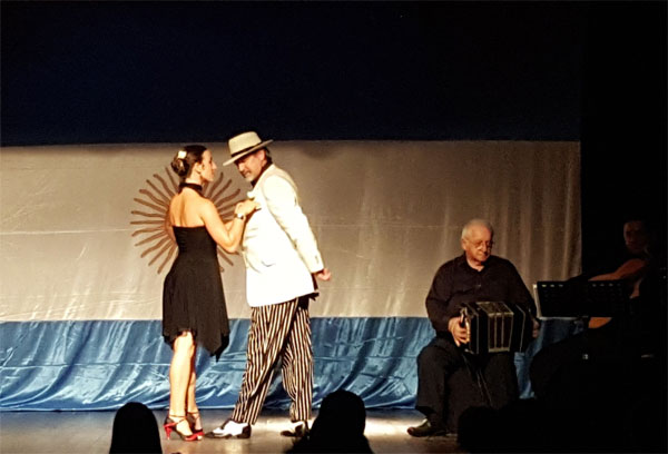 Image: Karel Wolberg and Oscar Caballero of Tango Times USA dancing with musicians Jorge Pinillos and Miguel Vettorello.
