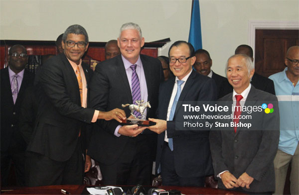 Image: Prime Minister Allen Chastanet, DSH Chairman Teo Ah Khing and Minister Bradley Felix believe the major investment is a win-win for the island and the investor. [PHOTO: Stan Bishop] 
