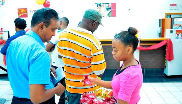 Image: Sharing treats with a customer