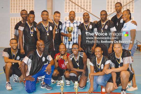 Image: A photo moment for the 2016 champions along with Acting Police Commissioner Severin Moncherry holding Championship trophy (Photo: Anthony De Beauville)