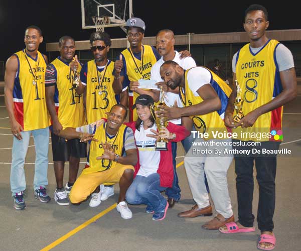 Image: Courts Jets SLBF Premier League Champions celebrate with KFC representative (Photo Anthony De Beauville)