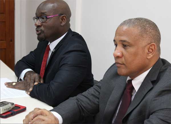 Image: Moses Jn Baptiste and Ernest Hilaire at the press conference.