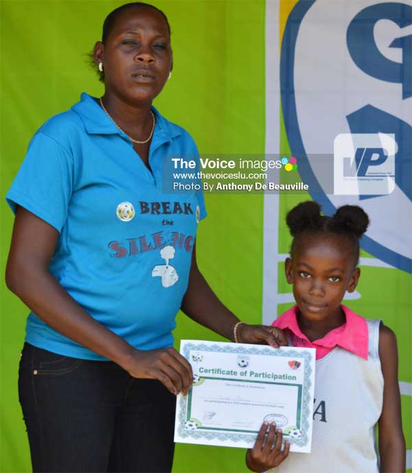 Image: Lendra Serieux receiving her Certificate of Participanion. (PHOTO: Anthony De Beauville)
