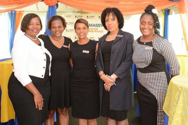 Image: Massy staffers at the Soufriere opening