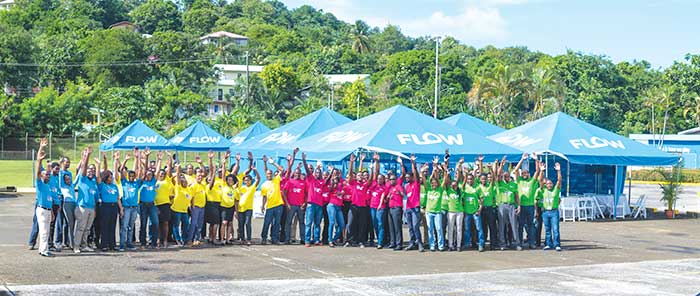 Image: FLOW Staff celebrating Mission Day