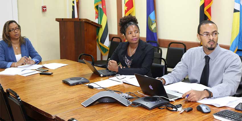 Image: OECS personnel at the meeting: Virginia Paul (centre) Head of the Trade Policy Unit, Tahira Carter (left) and  Ramon Peachey (left) of  OECS Communications