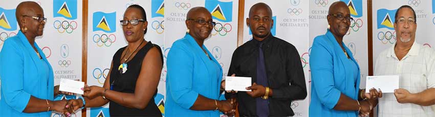 Image: (l-r) SLOC President Fortuna Belrose presenting cheque to Adela Arthur (secretary SLNNA), Shannon Lebourne (PRO SLBA) David Ferdinand (Secretary SLTTA) (Photo: Anthony De Beauville)