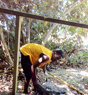 Image: Children cleaning up their Marigot environment