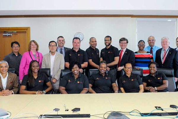 Image: Senior Executives of CIBC FirstCaribbean join the bank’s 2016 Achievers in the boardroom of its corporate headquarters in Barbados.