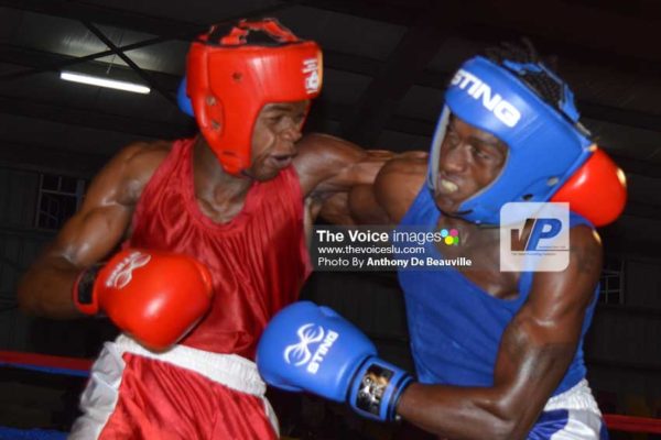 Image: Kareem Boyce turns on the heat versus Nelon Cyrus, also of Grenada. (Photo: Anthony De Beauville)