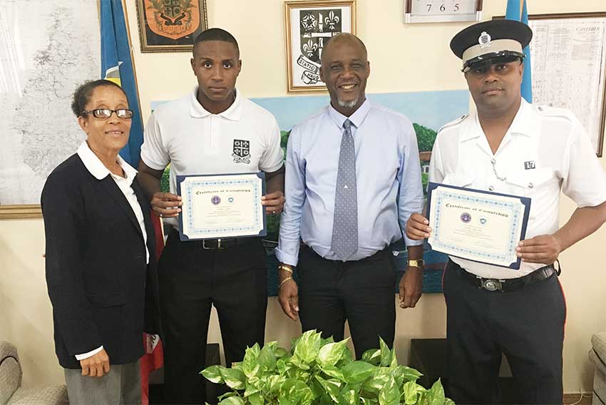 Image: (From left to right) -- CEO Anselma Calderon, Officer Joshua Lubin, Mayor Peterson D. Francis, and Sergeant YoneCamchon.