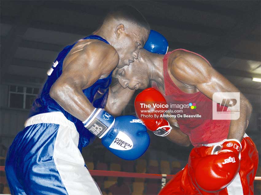 Image: Saint Lucia’s Nathan Ferrari versus Justin Edwards of Barbados. (Photo: Anthony De Beauville)