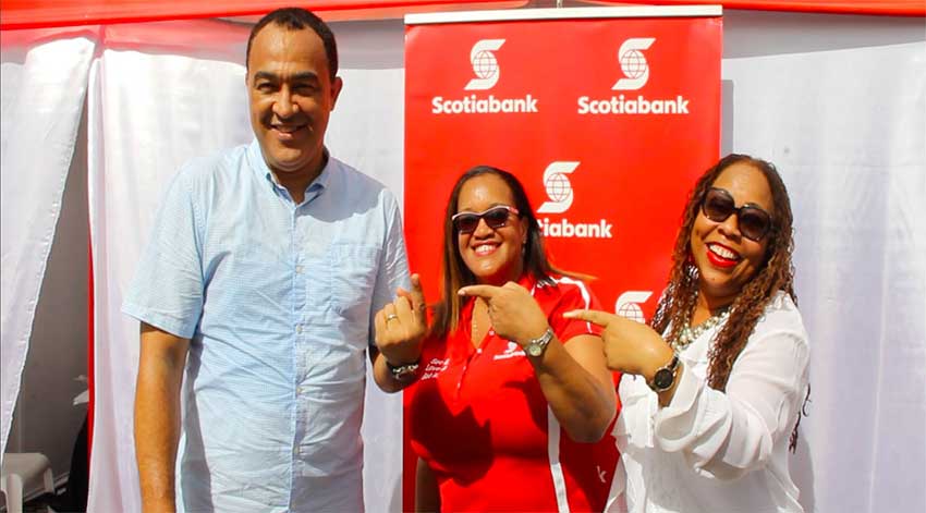 Image: Oh, yes, he did!!! Jamaica’s Health Minister Dr. Christopher Tufton (left) proudly displays the finger where blood was taken for his HIV test. Sharing the moment are Hope McMillan Canaan Scotiabank Jamaica’s Public & Corporate Affairs Manager (centre) and the Executive Director of the Jamaica National Family Planning Board Dr. Denise Chevannes.