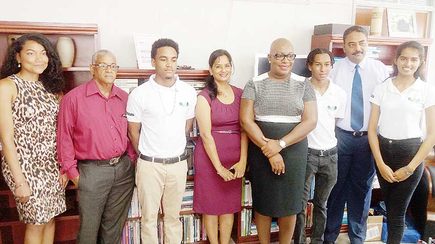 Image of Team 758 with parents and Minister Rigobert.