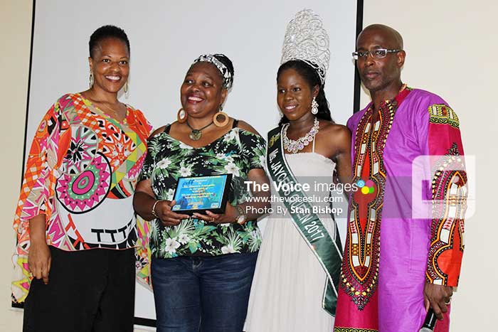 Image: Tet Paul proprietor Maureen Fontenelle, (second from left), flanked by Dr. Walls (far left), 2017 Jaycees Queen Ayana Dorsette of Antigua and Barbuda, and Ed “Bro Umoja” Herman.