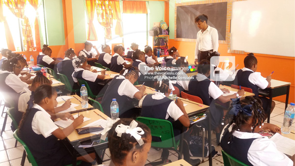 img: Class is in session at Ave Maria Girls Primary last Monday.  [Photos By Rochelle Gonzales]