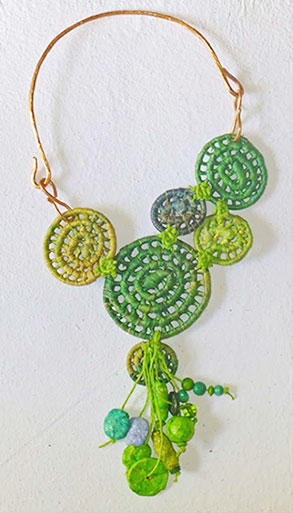 Image of green basket necklace by Finola Jennings-Clark.