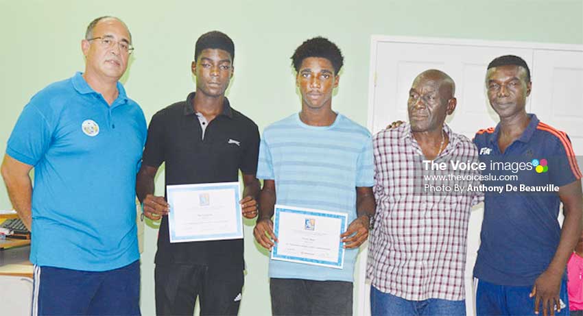 Image: (L-R) Vincent Boland -Team Manager, Rio Longville and Yannick Noel (goal scorers against Guyana); Albert St. Croix (Head Coach) and CesPodd, SLFA Technical Director. (PHOTO: Anthony De Beauville)
