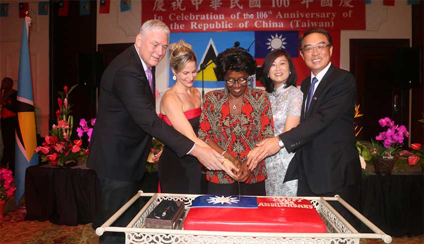 Image: Ambassador Shen and his wife, Ling-hon (far right) cut the ceremonial cake with Governor General Dame PearletteLouisy and Prime Minister Chastanet and his wife, Raquel, last Friday evening.