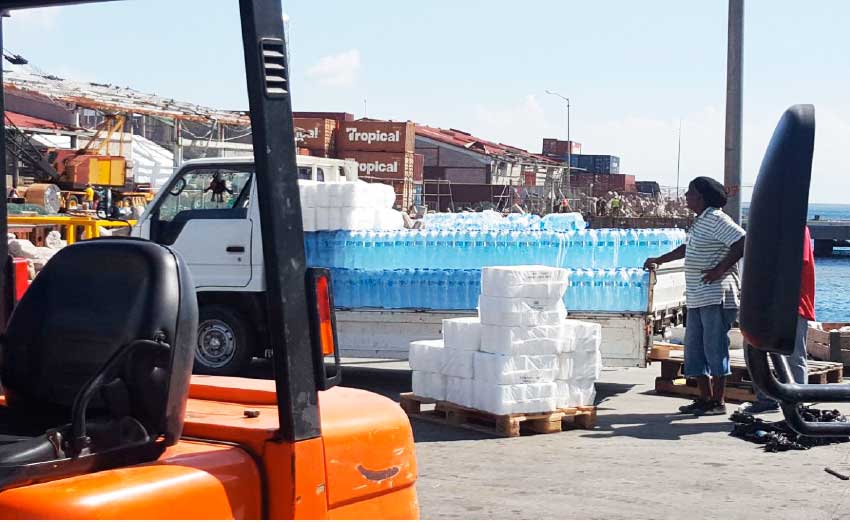 Image: Bottled water was among the essential items delivered to Dominica on the recent trip.
