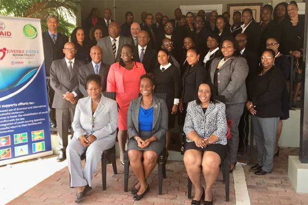 Image: Front row (L-R) : Gloria Augustus, Technical Specialist, JJRP2, OECS Commission; Simone Brown, Education Development Officer, USAID ESC; Her Ladyship Honourable Gertel Thom, Justice of Appeal and Chairman of Judicial Education Institute of the Eastern Caribbean Supreme Court. Also pictured are High Court Judges, and administrative representatives of the Eastern Caribbean Supreme Court, Magistrates of the OECS, OECS Bar Association, and OECS Ministry of Justice representatives.